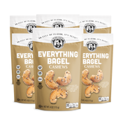 Three packages of Everything Bagel Cashews on a white background
