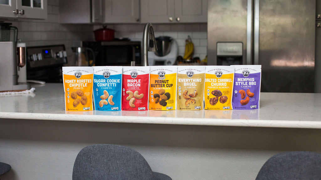 Row of snack packs on a kitchen counter with a blurred background