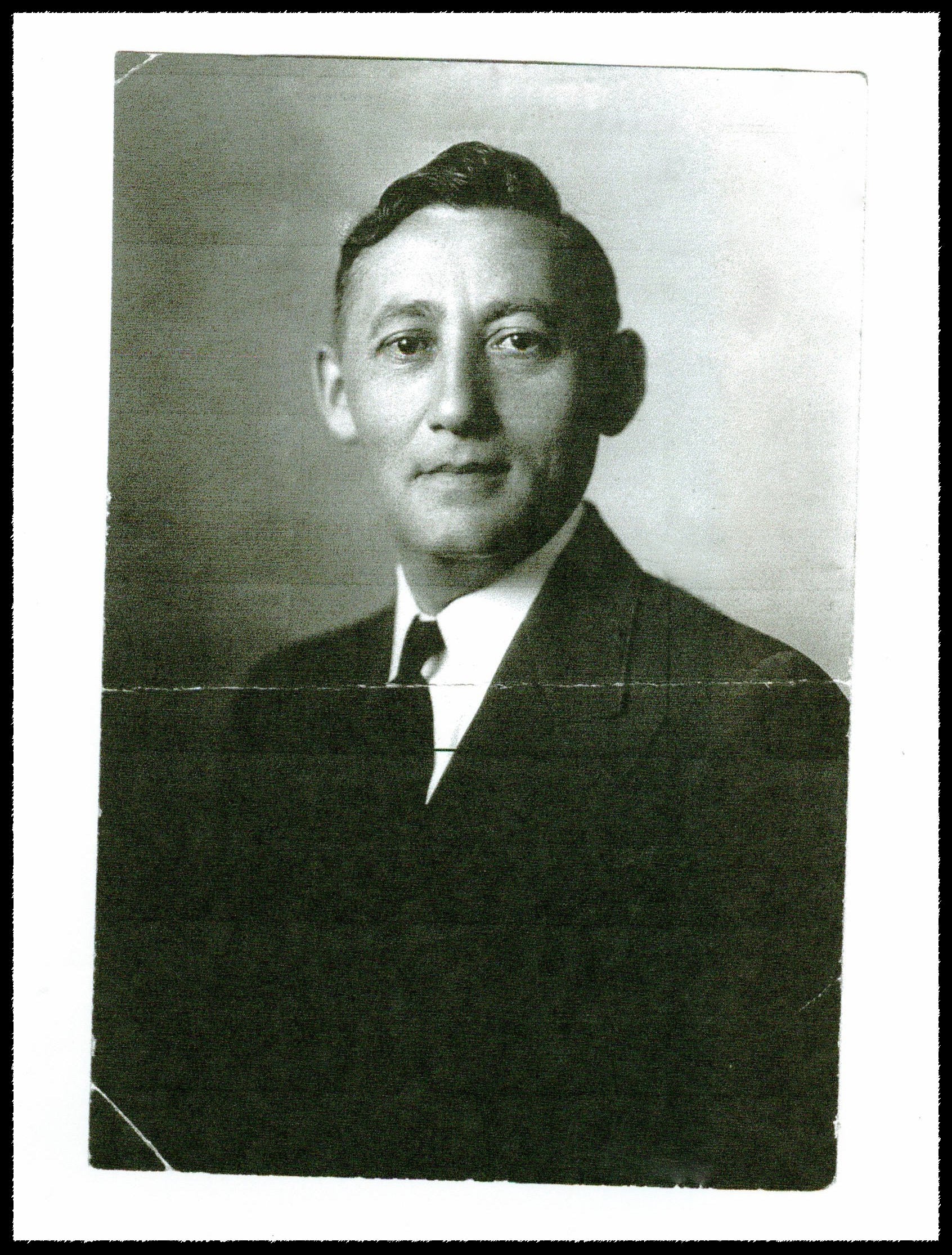 Black and white portrait of a Herman Mirowitz in formal attire