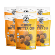 Three packages of Peanut Butter Cup flavored peanuts on a  backgroundhite